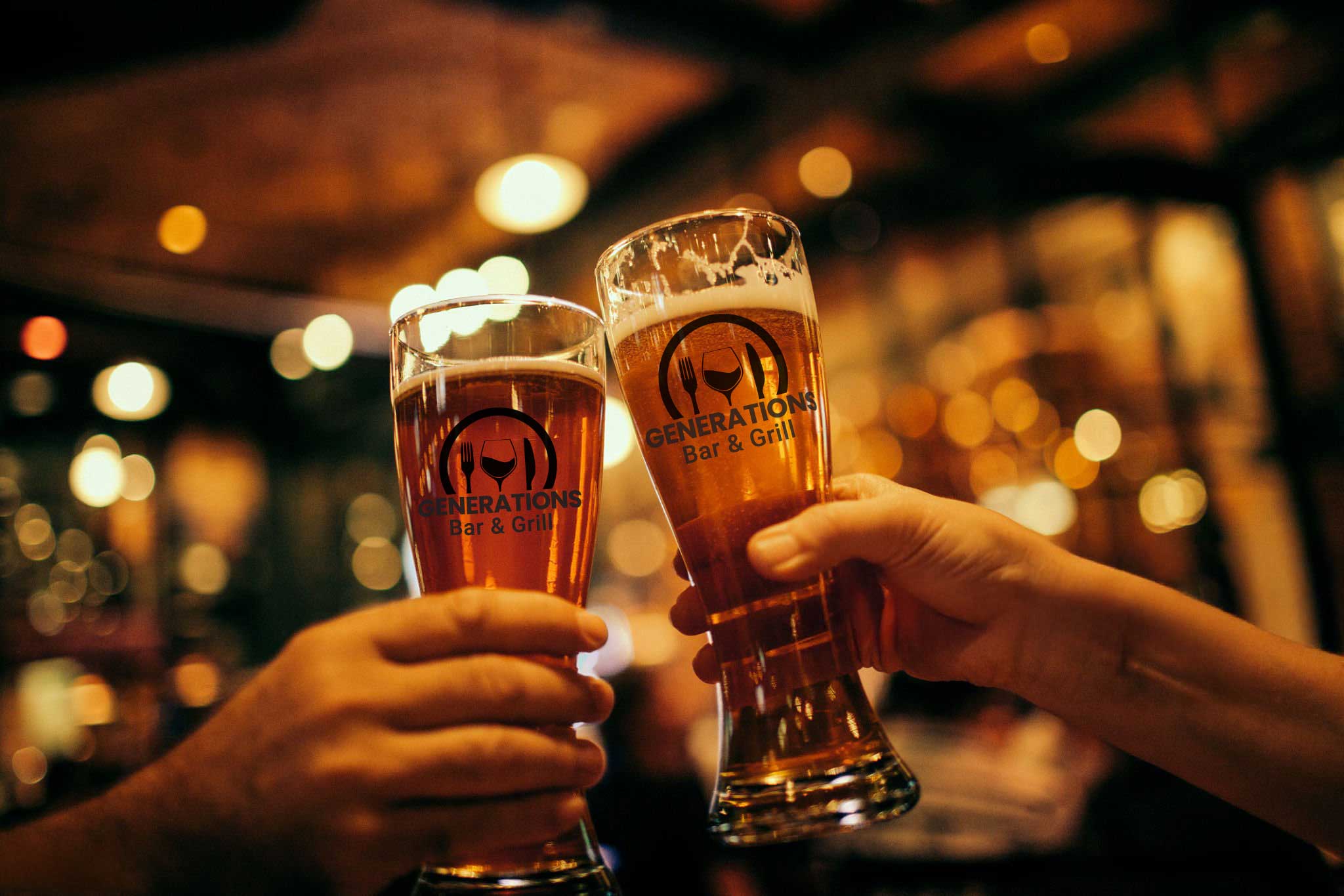 Interior view of Generations Sports Bar & Grill in Sherwood, OR, featuring two beer glasses with the bar’s logo clinking in a cheers.